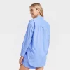 Women's Tunic Long Sleeve Collared Button-Down Shirt - Universal Thread™ White -Universal Thread Shop GUEST 427fce6f 2dbb 4a46 99d3 6deb64c81039